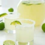 margarita punch in salt lined glass with lime wedge