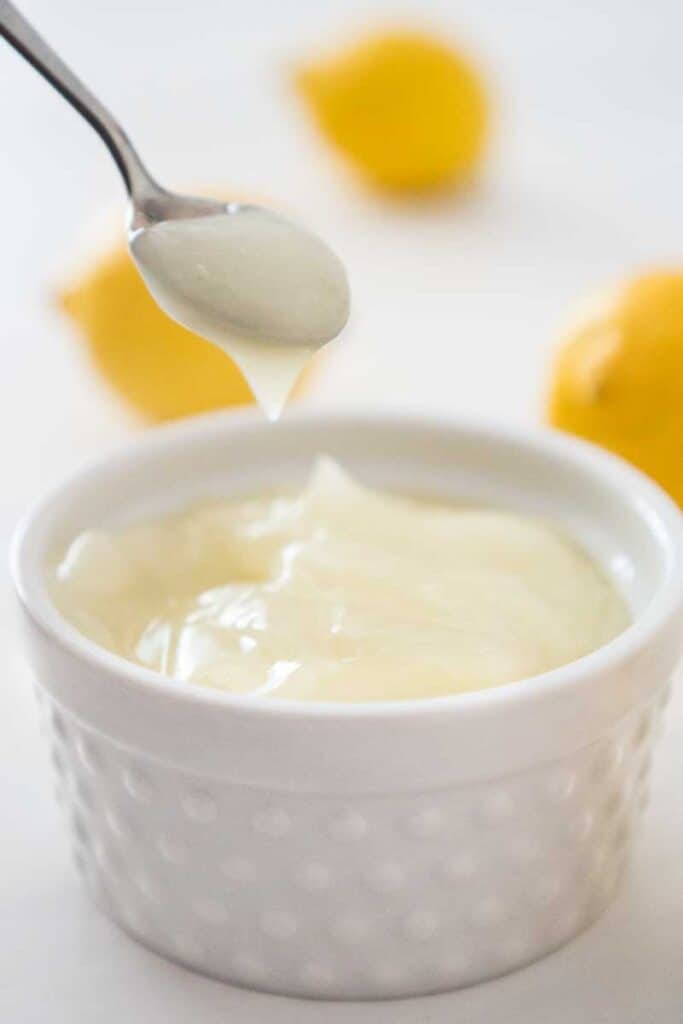 eggless lemon curd in white ramekin