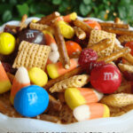 close up of Mayflower munch Thanksgiving snack mix with chex and candy corn