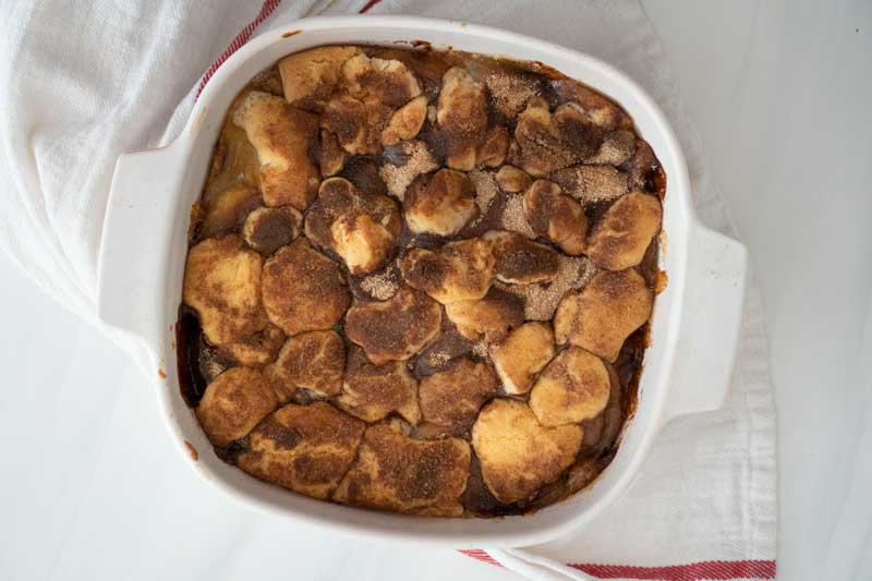 apple snickerdoodle cookie bars in a white dish