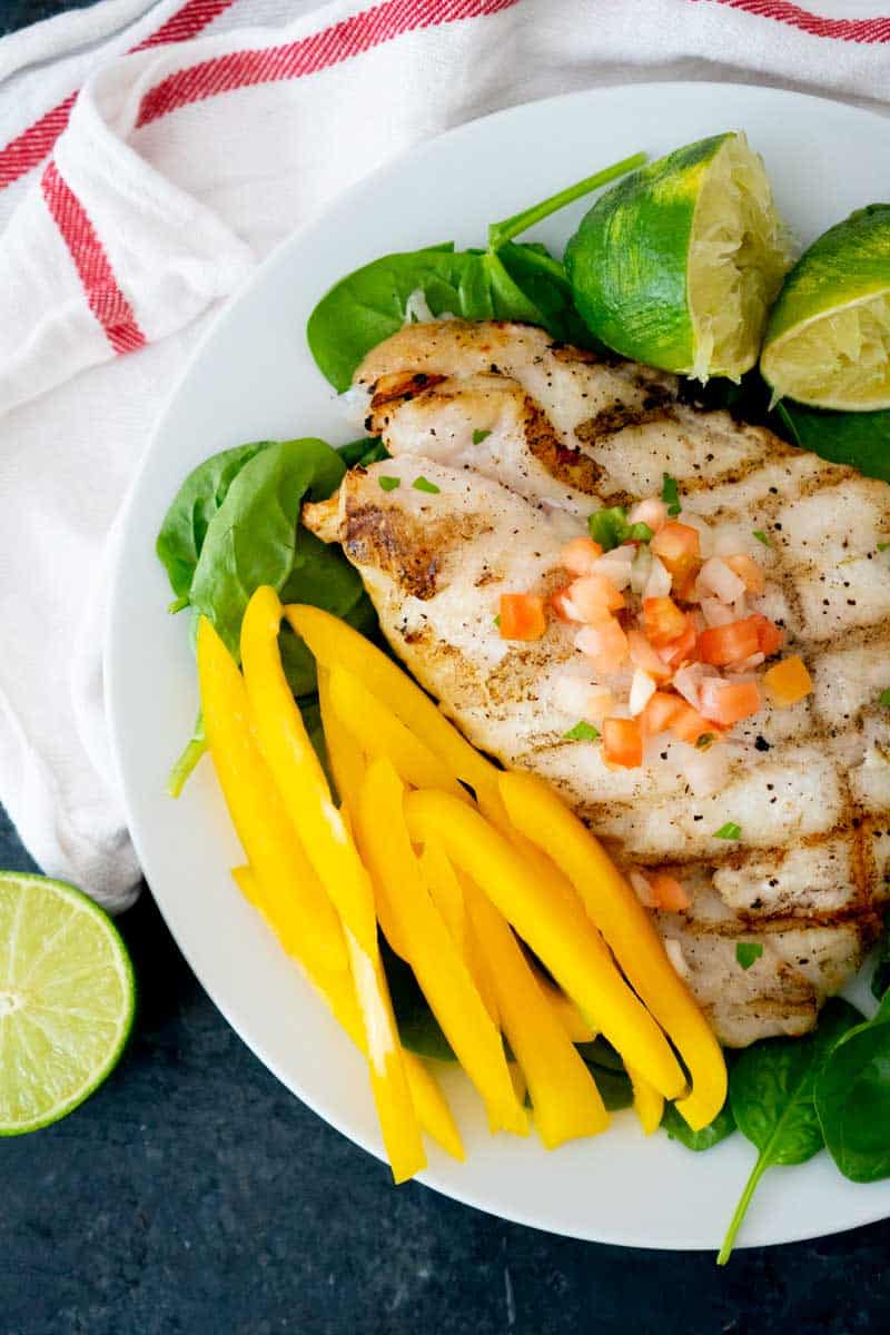 Key lime butter grilled grouper  on white plate