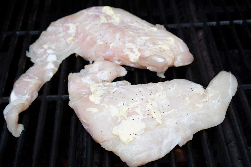 raw grouper fillets on the grill
