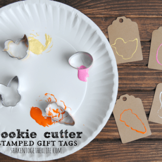 Use cookie cutters to make stamped gift tags!