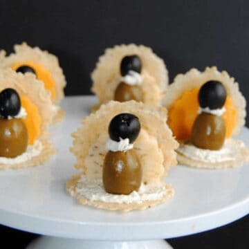 turkeys made out of olives and cheese slices for thanksgiving