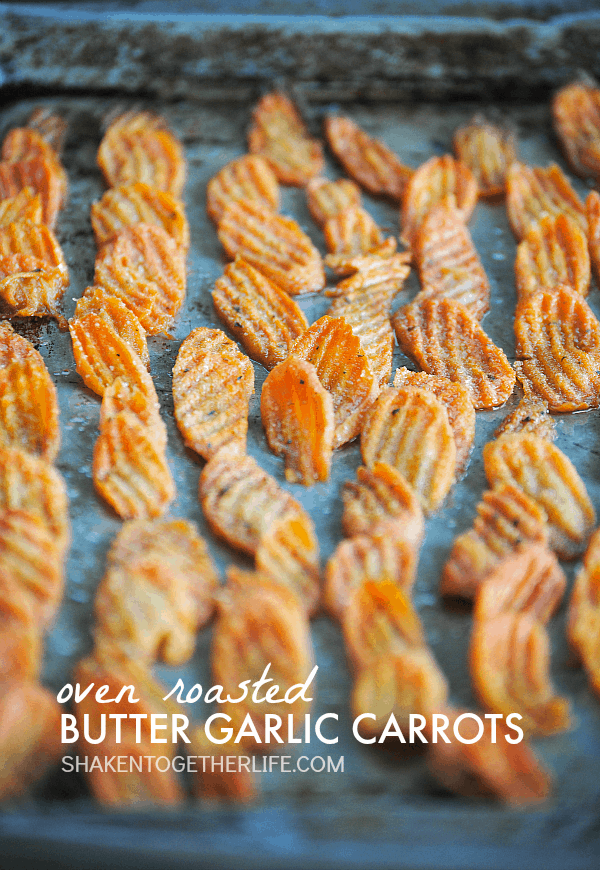 Easy and delicious, these Oven Roasted Butter Garlic Carrots are done in 30 minutes! Bet you can't eat just one!