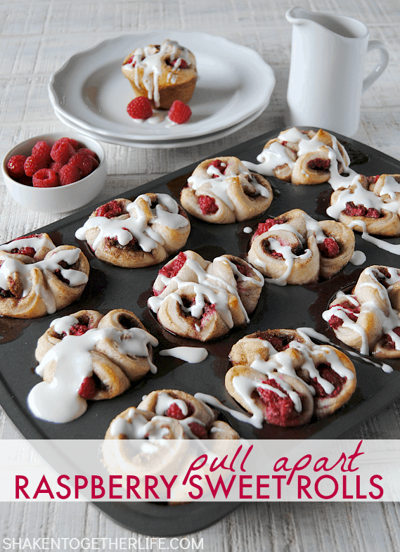 Pull apart raspberry sweet rolls start with refrigerated biscuits, are then filled with fresh tangy raspberries & drizzled with a sweet cream cheese glaze!