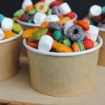 rainbow snack mix in paper cup