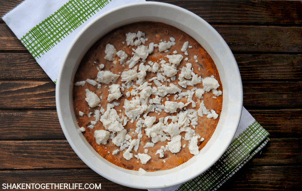 Creamy Bean Dip topped with crumbled cotija cheese