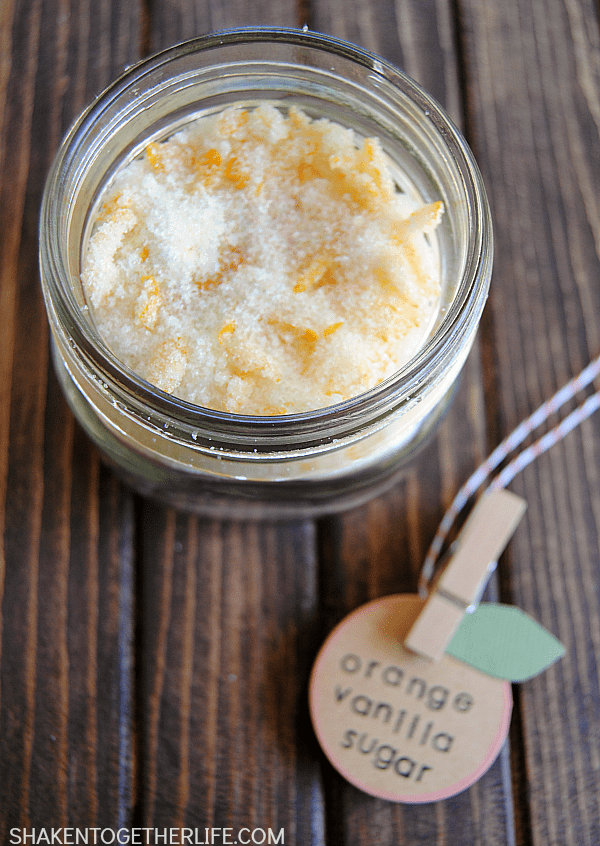 Homemade Orange Vanilla Sugar makes a sweet gift!  Sugar is infused with orange essential oil, vanilla and real orange zest. SO good in hot or iced tea, sprinkled over buttered toast or used in baking recipes!