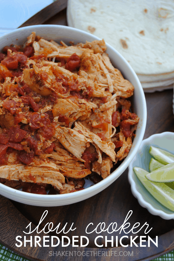 Slow Cooker Shredded Chicken is a staple in our house for easy meals! The flavorful, tender chicken is perfect for tacos, nachos, burritos and taco salads!