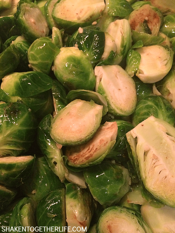 Brown Sugar Bacon Brussel Sprouts - fresh brussel sprouts simmer in bacon and garlic, drizzled with lemon juice and then glazed in a brown sugar soy sauce. This dish will change the way you think about brussel sprouts! #SplendaSweeties #SweetSwaps