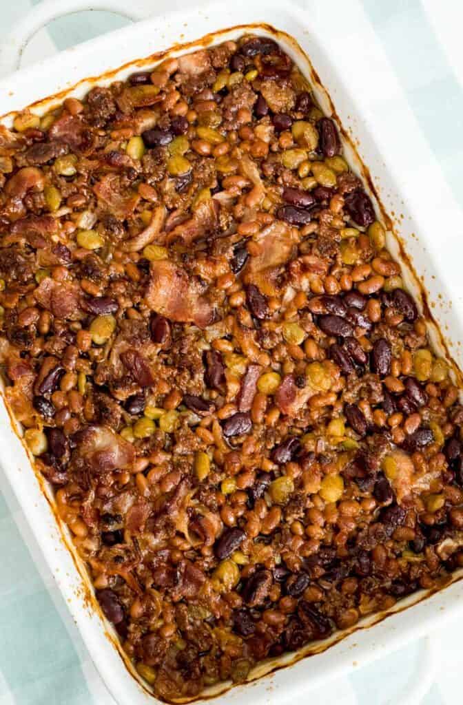 calico beans baked beans in white baking dish