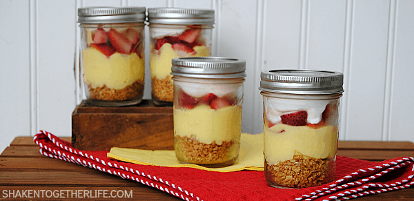 Lemon Berry Pudding Parfaits with layers of graham crackers, pudding, fresh berries and fluffy whipped topping are a lightened up Summer dessert!