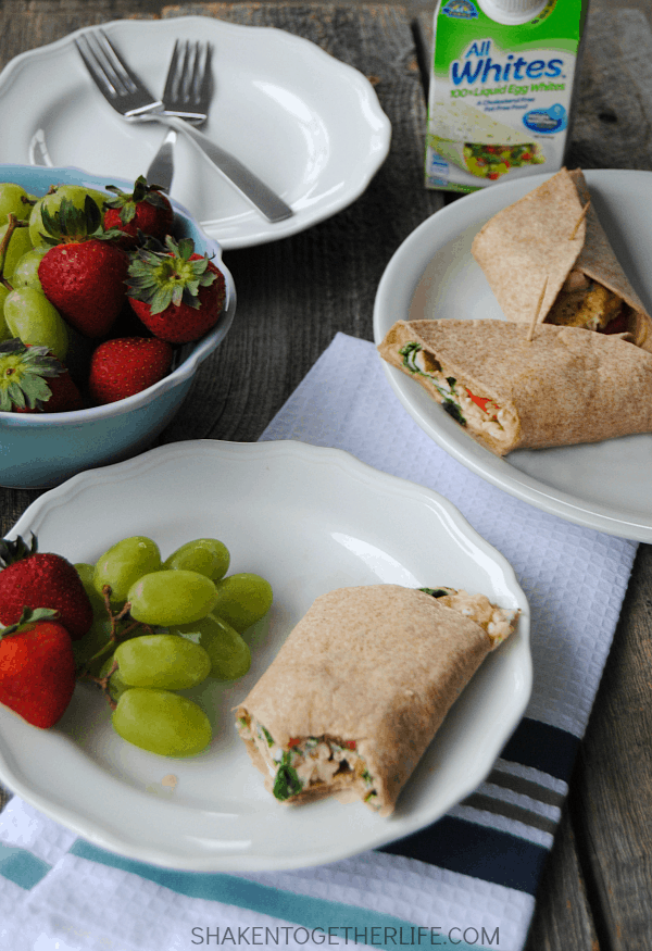 Mediterranean breakfast wraps are a healthy way to start the day! Packed with egg whites, spinach, tomatoes, feta and even hummus, this wrap is protein packed and hearty enough for brunch or lunch, too!