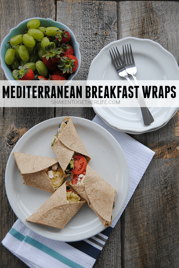 Mediterranean breakfast wraps are a healthy way to start the day! Packed with egg whites, spinach, tomatoes, feta and even hummus, this wrap is protein packed and hearty enough for brunch or lunch, too!