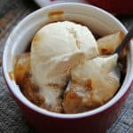 caramel apple cobbler with ice cream on top