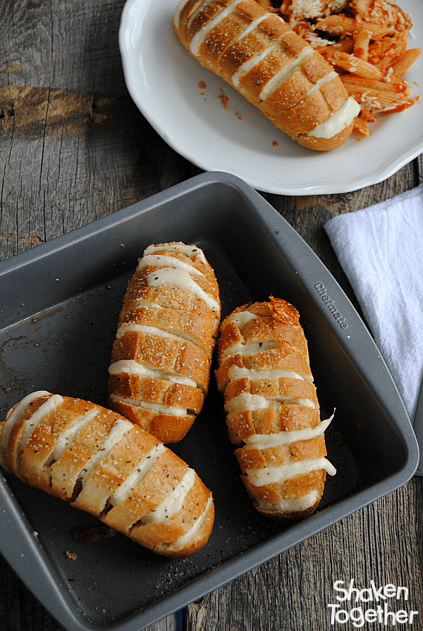 Mozzarella Stuffed Garlic Rolls are a quick and easy side dish! Our family loved to pull apart these ooey gooey cheesy rolls!