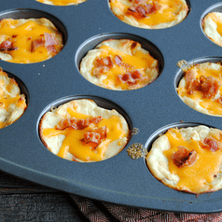 Twice Baked Potato Cups are the perfect way to use those leftover mashed potatoes! With lots of cheese and bacon, they bake up golden on the outside and fluffy on the inside!