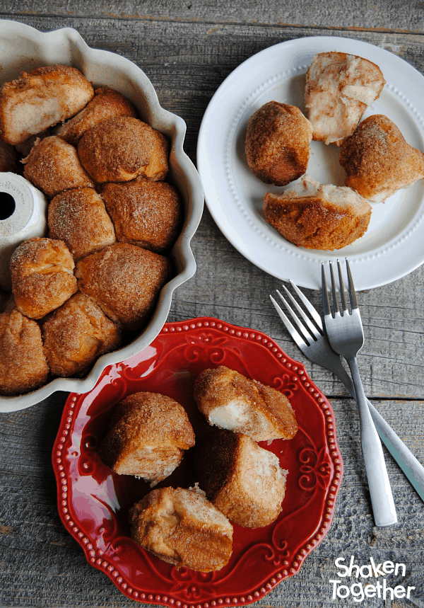 Cream Cheese Stuffed Monkey Bread Bites! These start with refrigerated biscuits, get stuffed with your favorite flavor of cream cheese, rolled in cinnamon sugar and baked into sweet little bites of delicious!