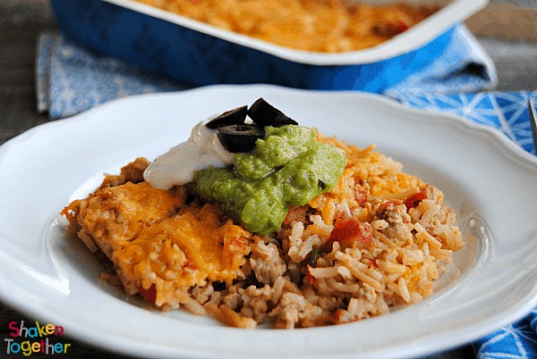 With only 4 ingredients, this Pork Taco Rice Casserole is easy and hearty! Serve it with your favorite taco toppings and cornbread!