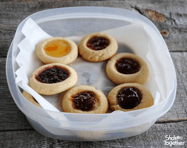 Soft buttery sugar cookies filled with your favorite fruity jam - these might be the easiest Jam Thumbprint Cookies ever!