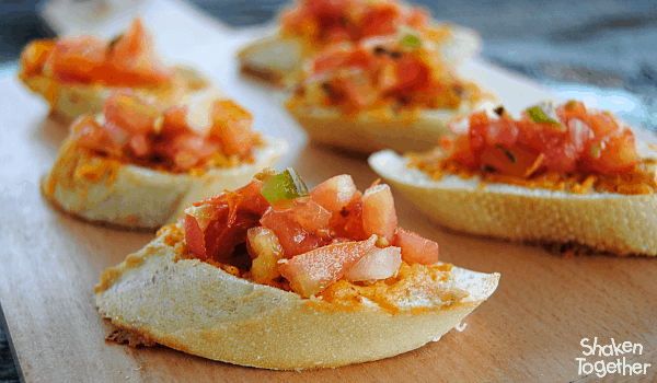 We can't get enough of this Fiesta Bruschetta made with melty taco seasoned cheese and fresh salsa!