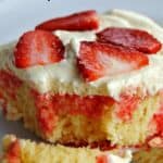lemon strawberry poke cake with bite on fork