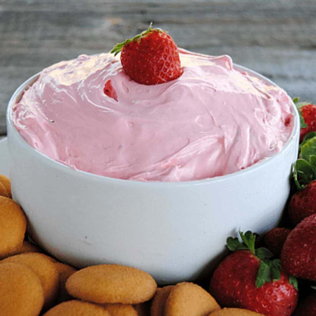 strawberry marshmallow dip in white bowl