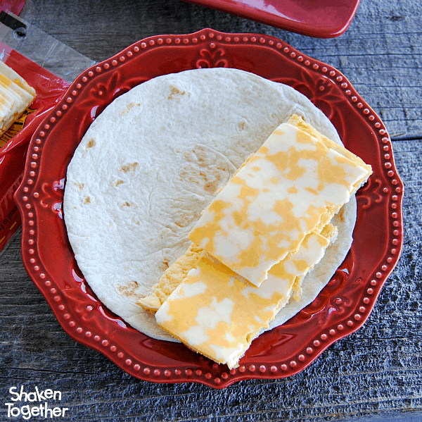 You can't make Breakfast Soft Tacos without the cheese!