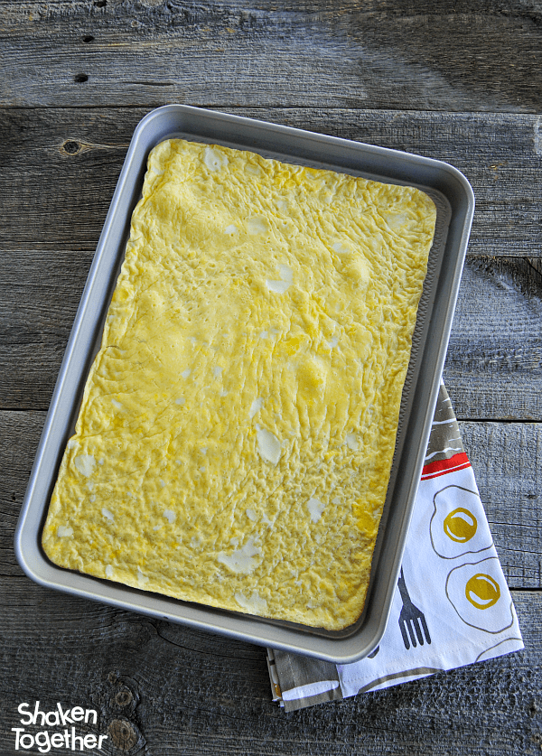 Sheet Pan Eggs - such an easy way to prepare a big batch of breakfast sandwiches, make microwave omelets or just feed a hungry crowd!