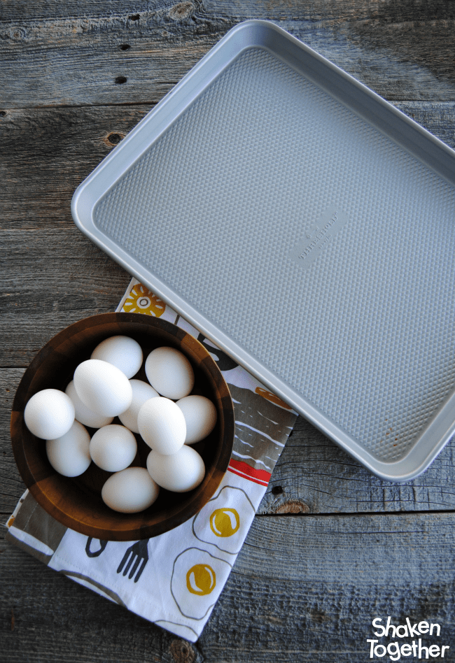 bowl of eggs and empty sheet pan
