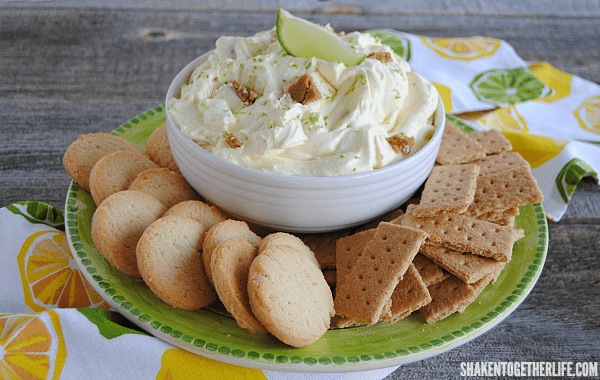 Key Lime Pie Dip with graham crackers and sugar cookies on plate