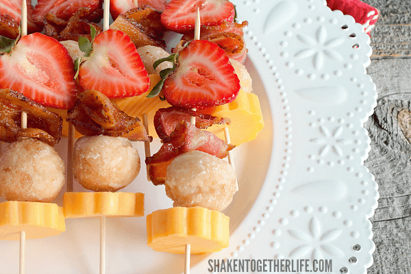 Berry Brunch Kabobs on white plate on wood table