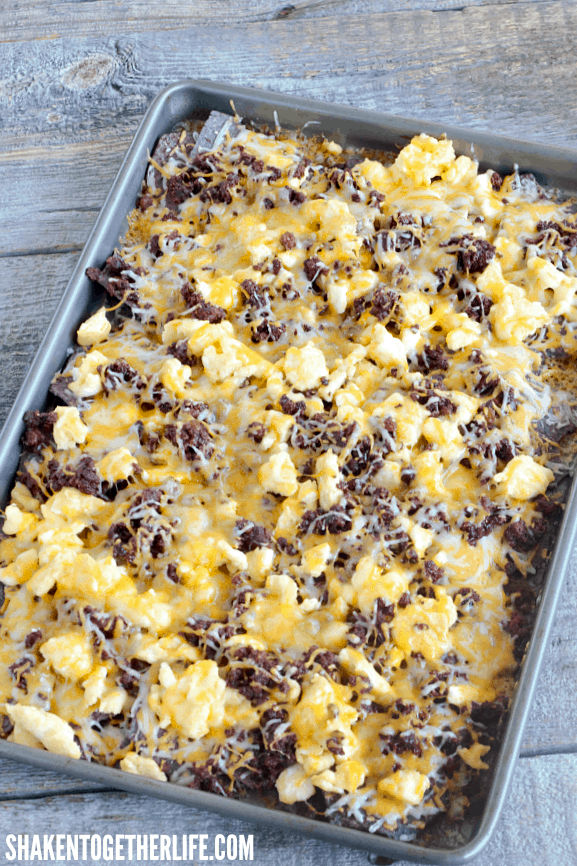 More cheese and a quick trip to the oven means these Breakfast Nachos are ready to top with salsa and Mexican crema!
