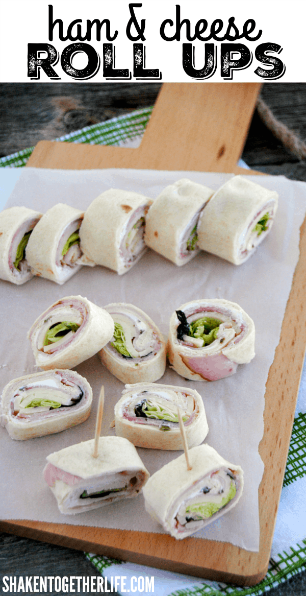 Easy Ham & Cheese Roll Ups - Layers of flavored cream cheese, ham, cheese and crisp lettuce rolled up in soft tortillas! Perfect for lunch boxes and parties!