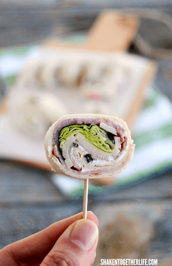 Ham & Cheese Roll Ups are a great way to jazz up lunch boxes and they are one of our most popular party appetizers!
