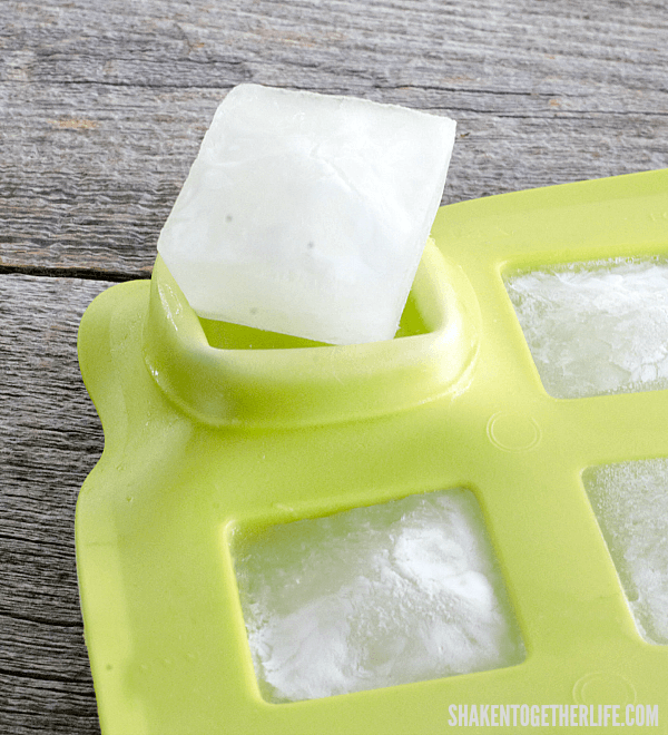 Once they're frozen, just pop the Jello Ice Cubes out of the molds and fill a glass!