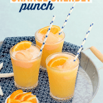 Tropical Orange Sherbet Punch is on repeat this Summer! Tropical fruit juices, lemon lime soda and scoops of orange sherbet make this punch a family favorite!