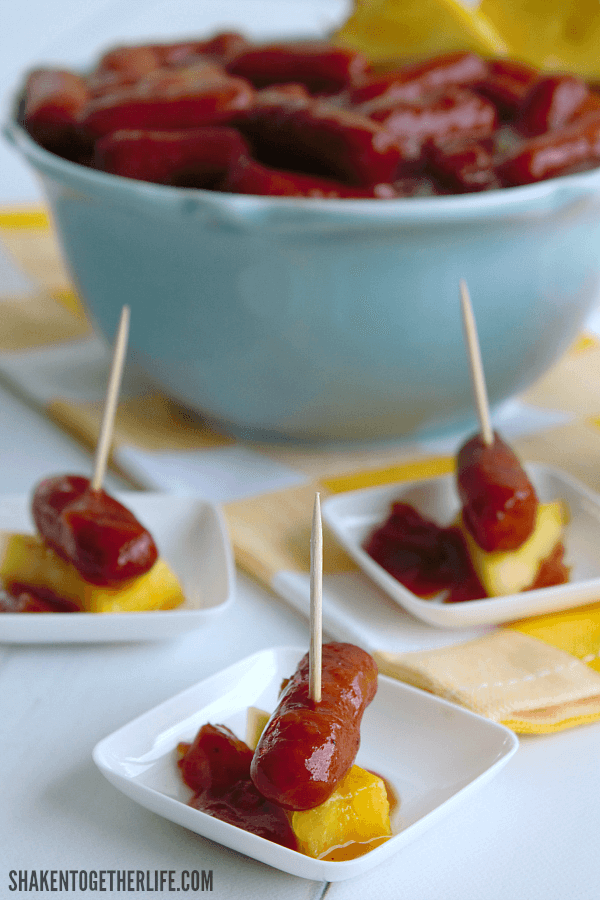 Family and guests will love these sweet and smoky Crock Pot Hawaiian Lit'l Smokies - what an easy Summer appetizer!