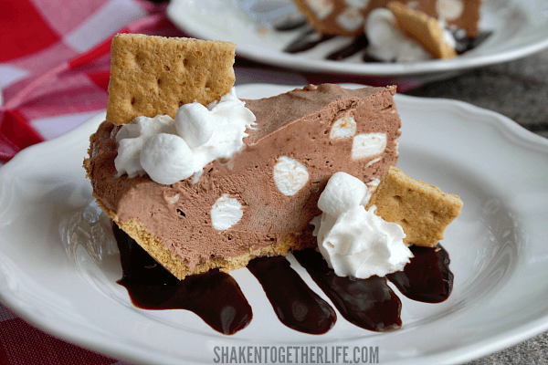 S'mores lovers can't get enough of this cool, creamy Frozen S'mores Pudding Pie! No fire, no bake and SO easy!