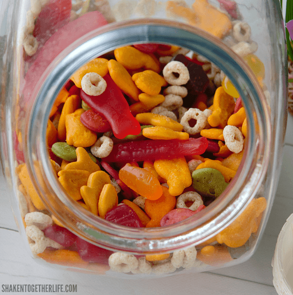 Stir together a big bowl of our colorful, sweet and salty Shark Week Snack Mix for Shark Week, a shark or ocean themed party, a trip or Sea World or a Nemo and Dory movie day!