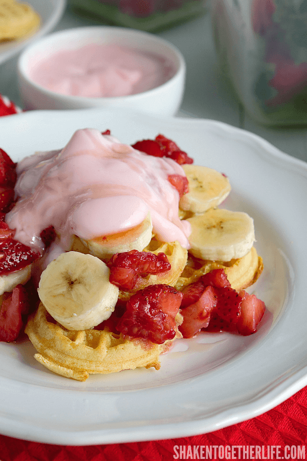 Banana Berry Breakfast Nachos are almost too much fun for breakfast! We love the mini waffles and fruity toppings!