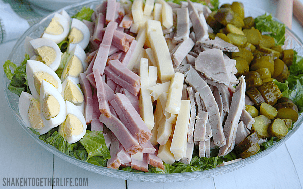 If you like Cuban sandwiches, then you will LOVE this Cuban Cobb Salad! It is loaded with all of the classic flavors of a Cuban sandwich including a delicious mustard vinaigrette!