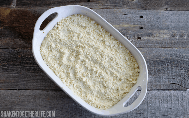 A lemon cake mix is the next layer of this easy Lemon Lime Dump Cake recipe