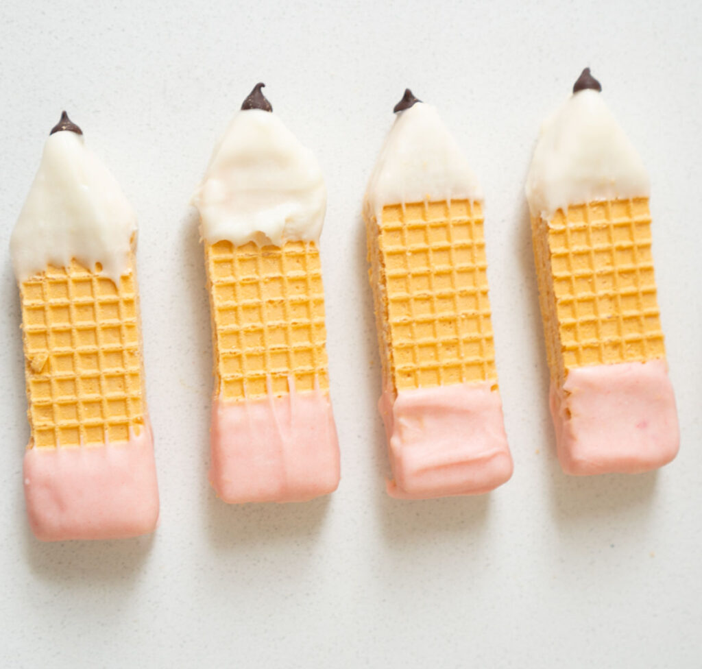 sugar wafer cookies dipped in chocolate to look like pencils