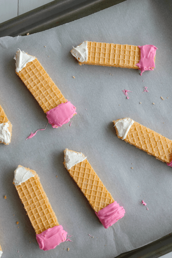 White candy melts cover the points of these Sugar Wafer Pencil Cookies!