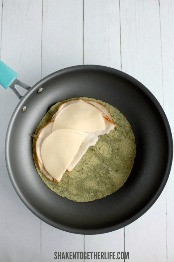 Layer roasted chicken and provolone on a spinach herb tortillas for these Lunch Box Quesadillas.