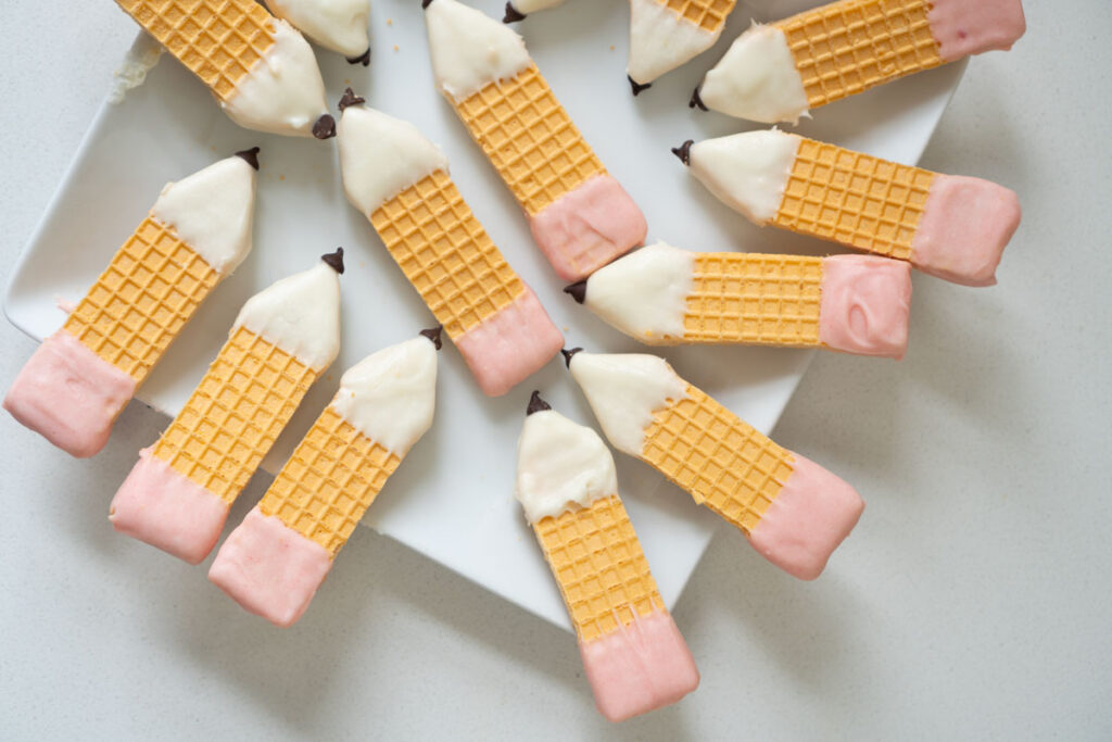 sugar wafer cookies dipped in chocolate to look like pencils