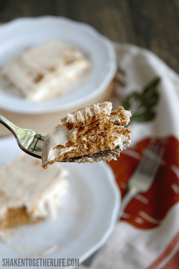 One bite of this Pumpkin Spice Eclair Cake on fork