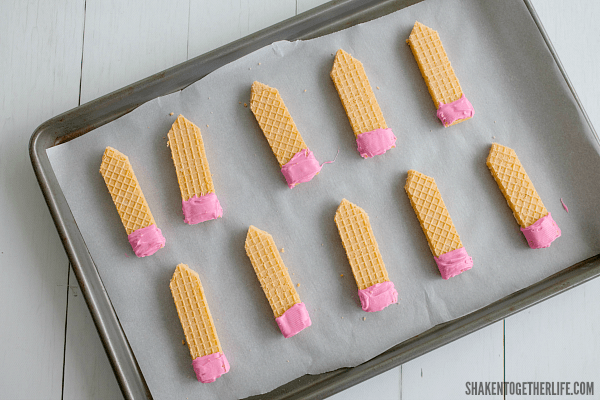 Sugar Wafer Pencil Cookies - cut the end of each cookie and coat the opposite end in pink candy melts.
